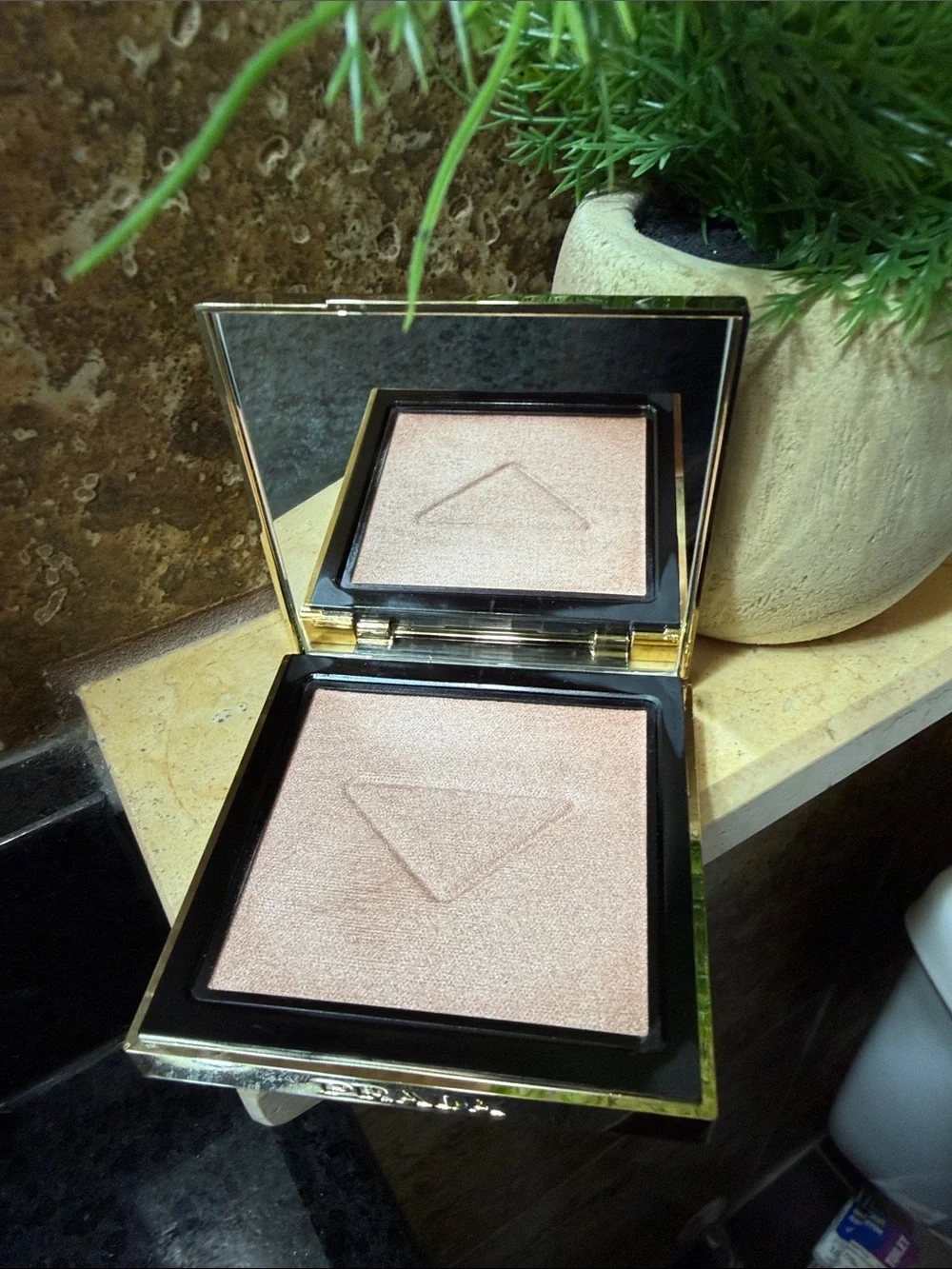 Prada Light Glowing Highlighter Powder 001 $90